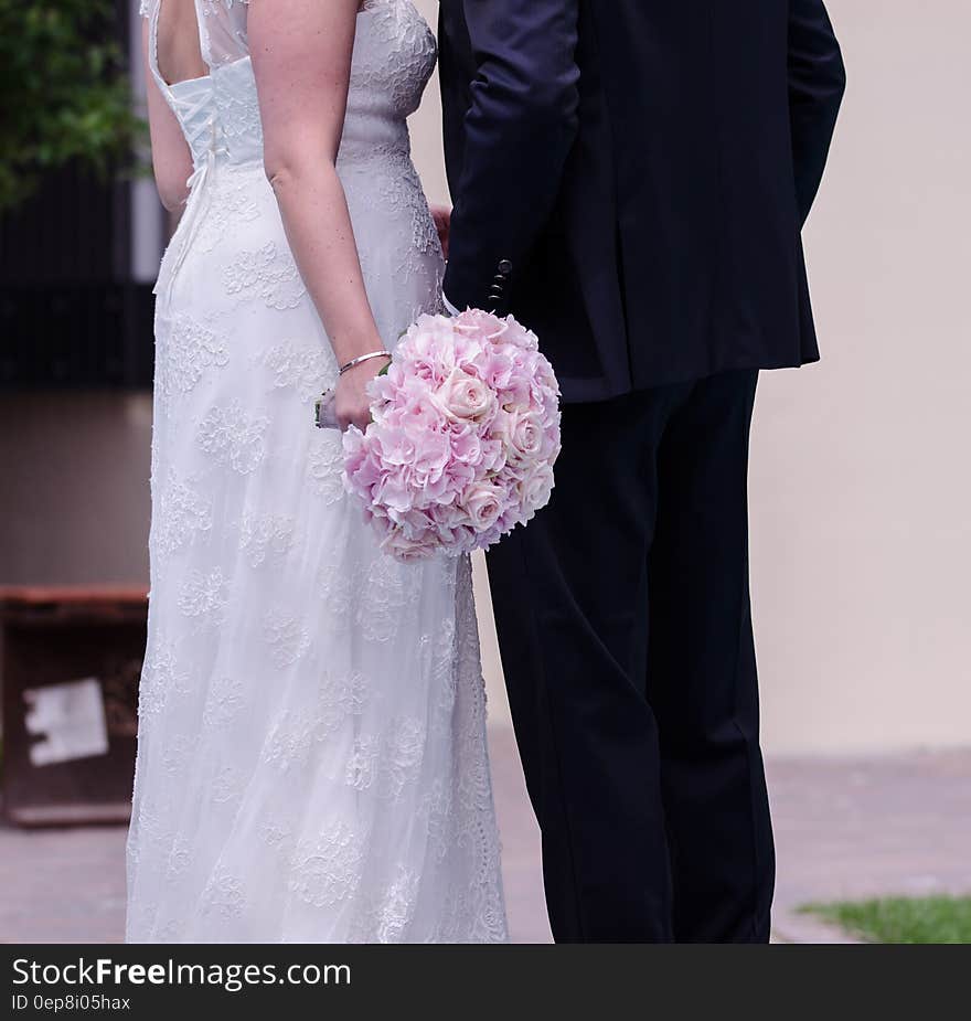 Person Holding Pink Rose Bouquet