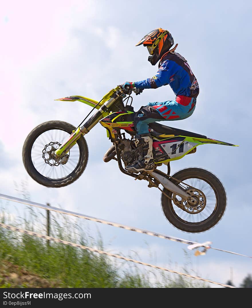 Person Doing Stunt in Motocross Dirt Bike