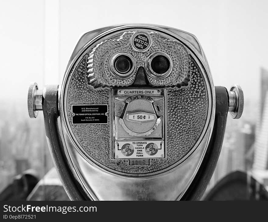 Close up of scenic viewfinder in black and white in urban setting.