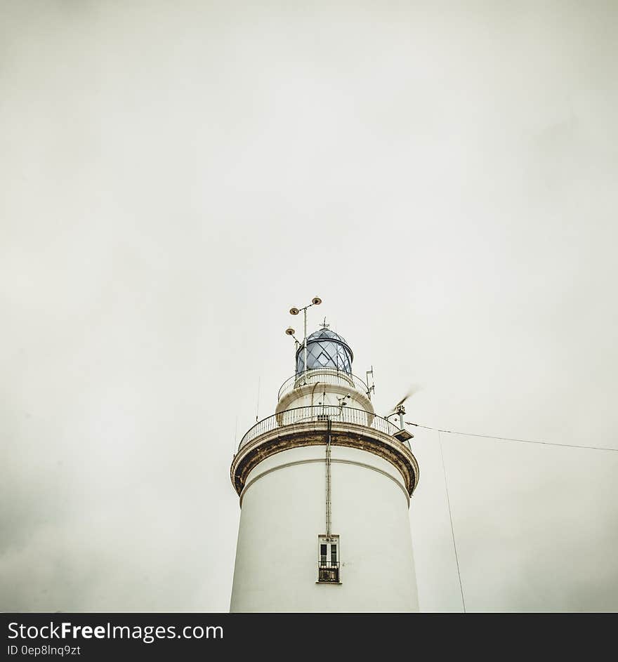 White Light House Under White Sky