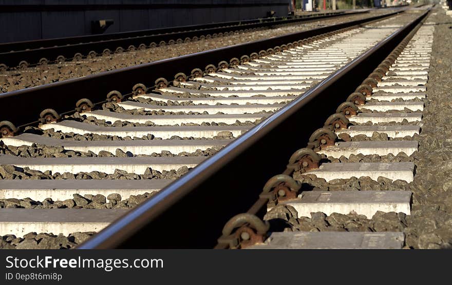 Black and Gray Metal Train Rail