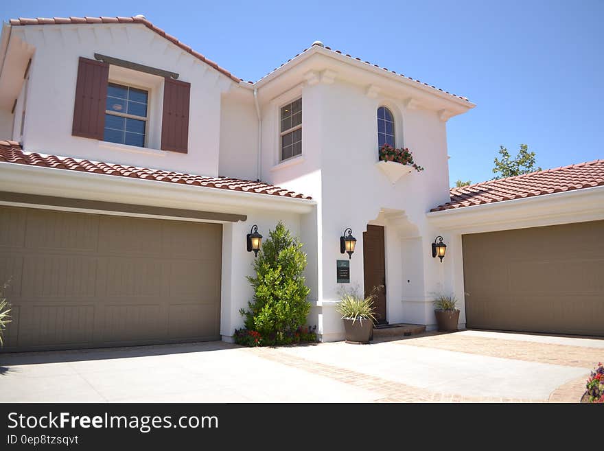 White Concrete 2-storey House