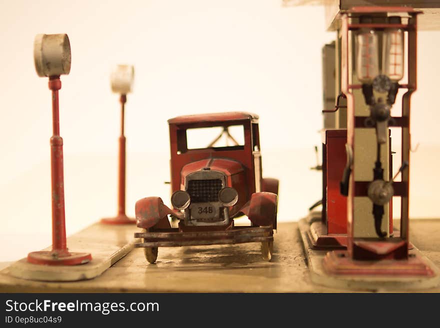 Antique car and gas station toys.