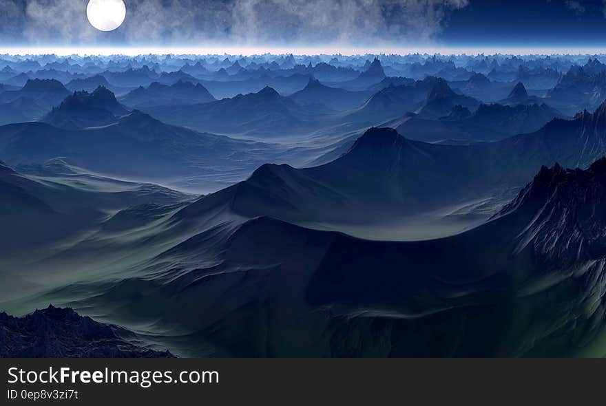 Full moon in sky over hillside landscape or ocean waves with mist or fog at night. Full moon in sky over hillside landscape or ocean waves with mist or fog at night.