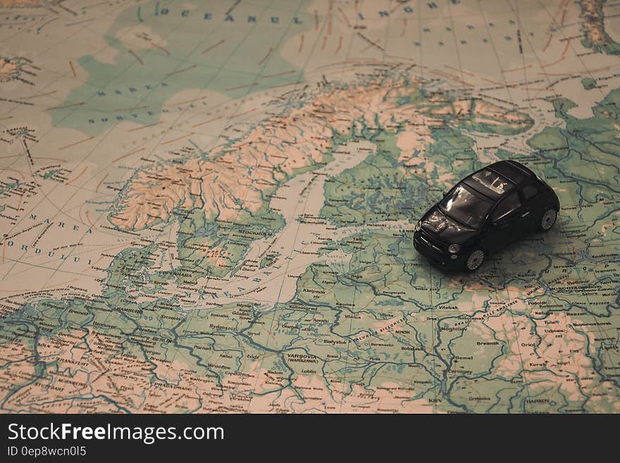 A miniature car over the map of Eastern Europe, Baltic and Russia. A miniature car over the map of Eastern Europe, Baltic and Russia.