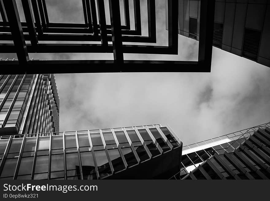 A black and white photo of architectural details in a modern city. A black and white photo of architectural details in a modern city.