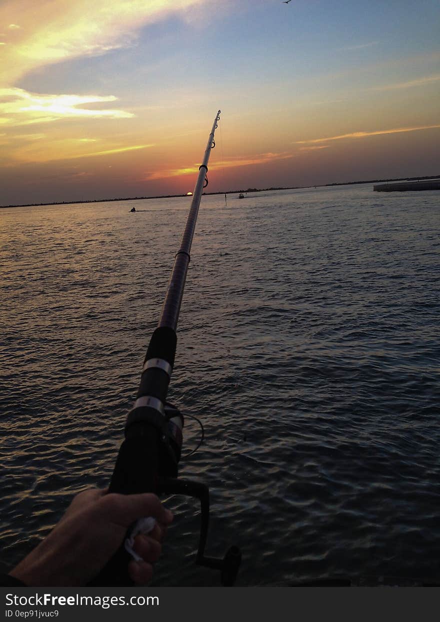 People Fishing on Sea