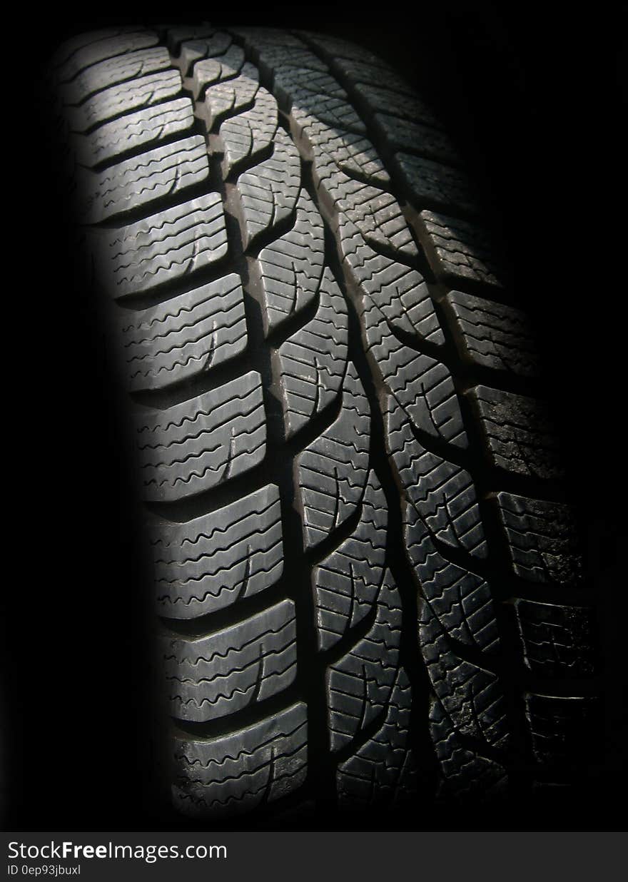 Close up of rubber tire treads.