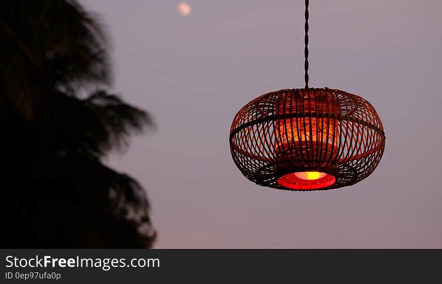 Brown Pendant Lamp during Nighttime