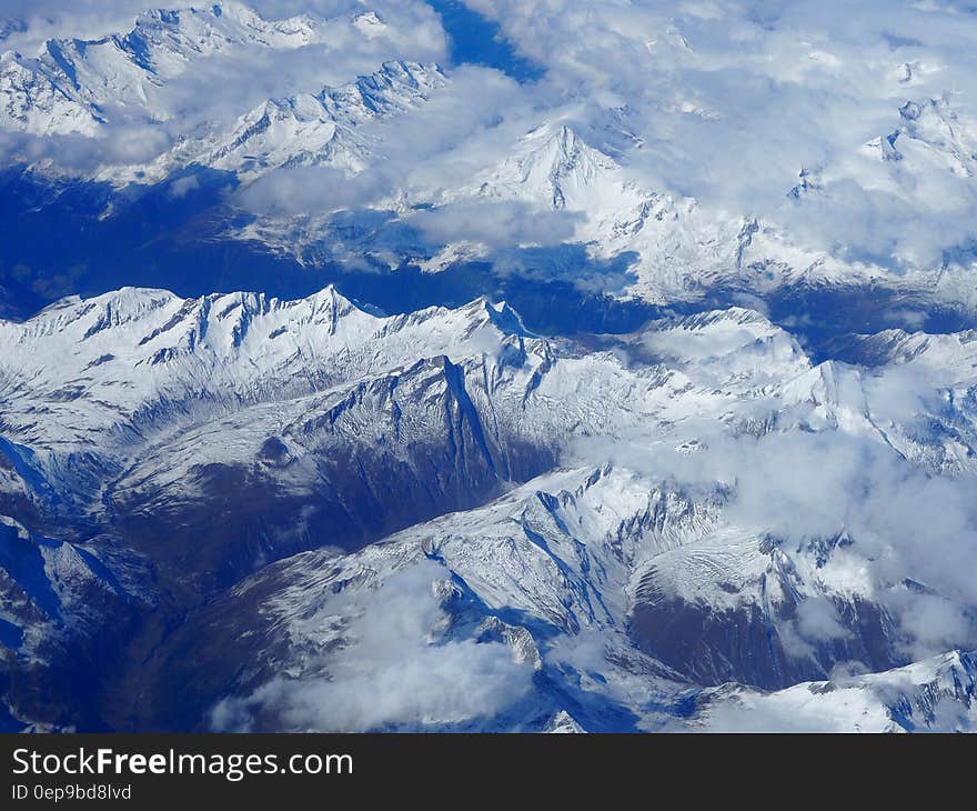 Blue White Clouds and Mountains Photo