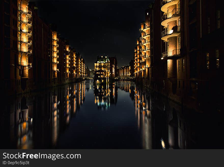 Reflection of Buildings on Water during Nighttime