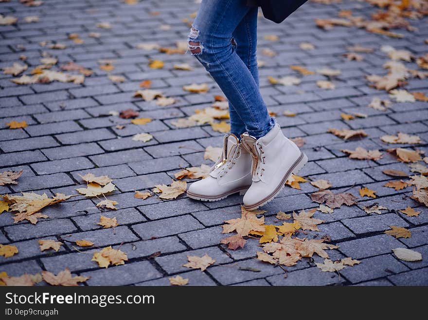 Person Wearing White Work Boots