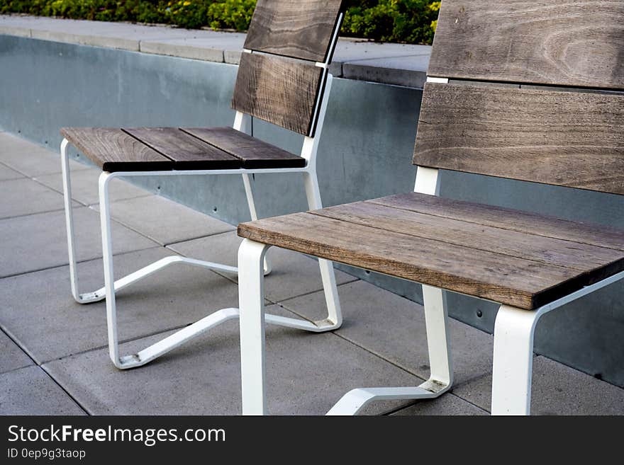 2 Wooden Chair on Top Tile Outdoor