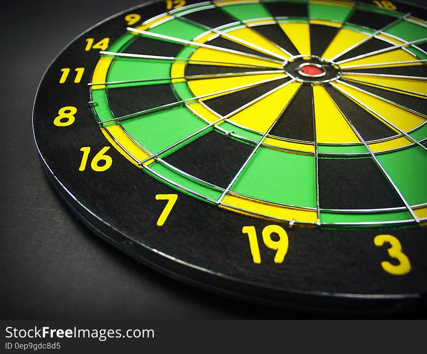 Green Yellow and Black Dartboard