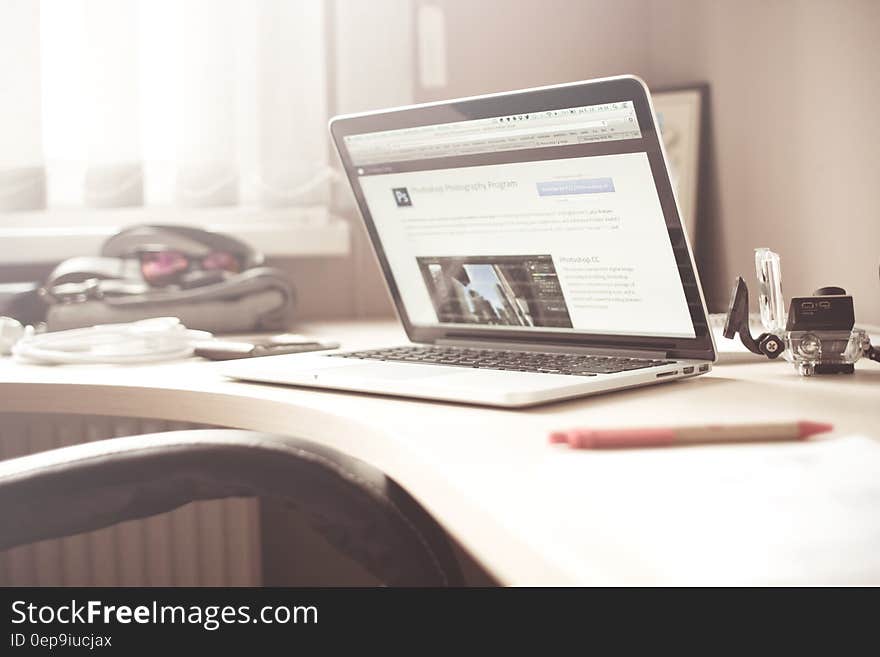 Black and Gray Laptop Computer on Writing Desk