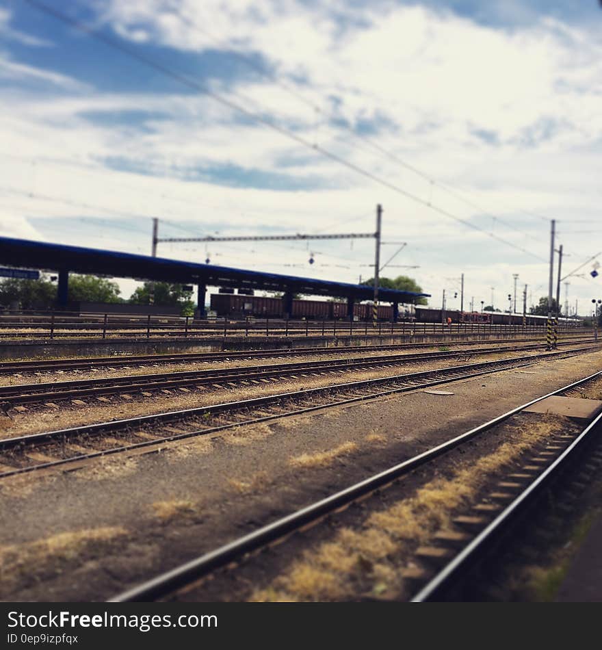 Rail Way Under Cloudy Sky