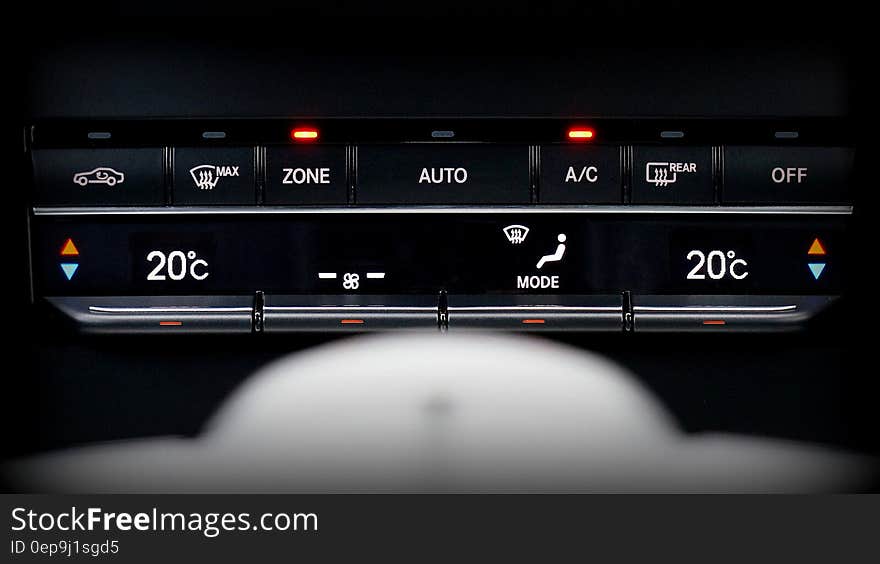 Close up of temperature controls on dash of modern automobile. Close up of temperature controls on dash of modern automobile.