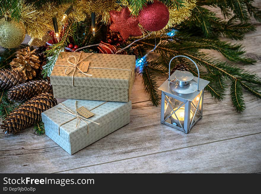 Christmas gifts under a tree.