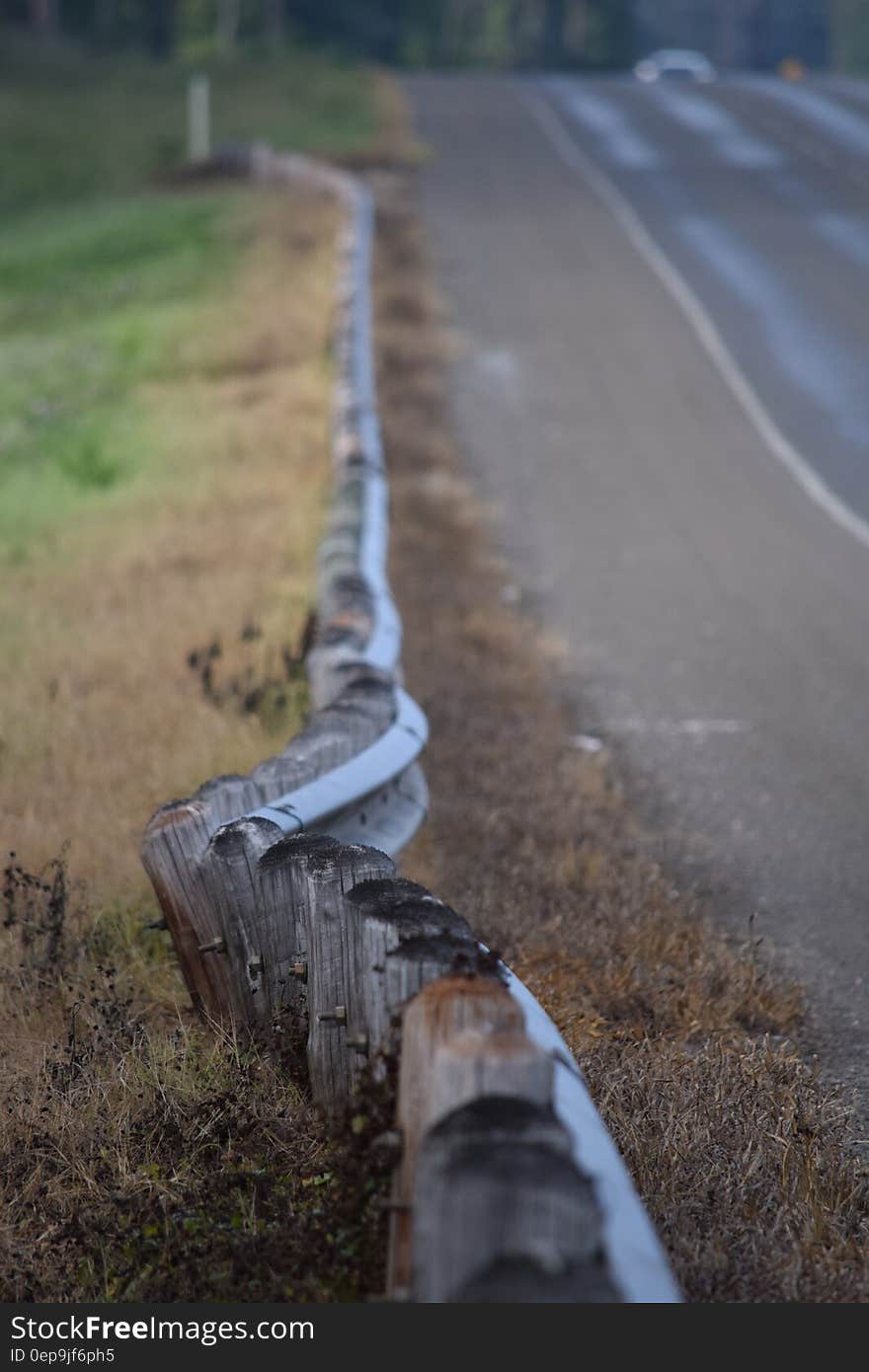 Wooden Small Fences Along the Road