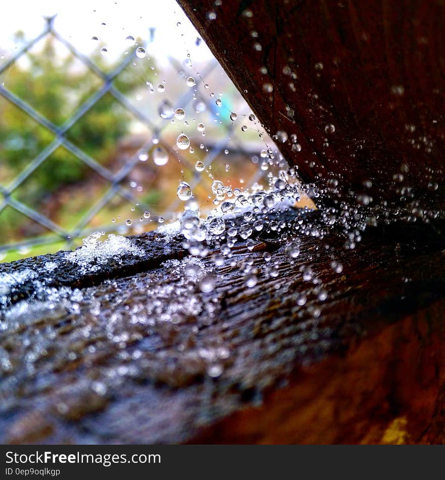 A splash of water with drops flying across the frame. A splash of water with drops flying across the frame.