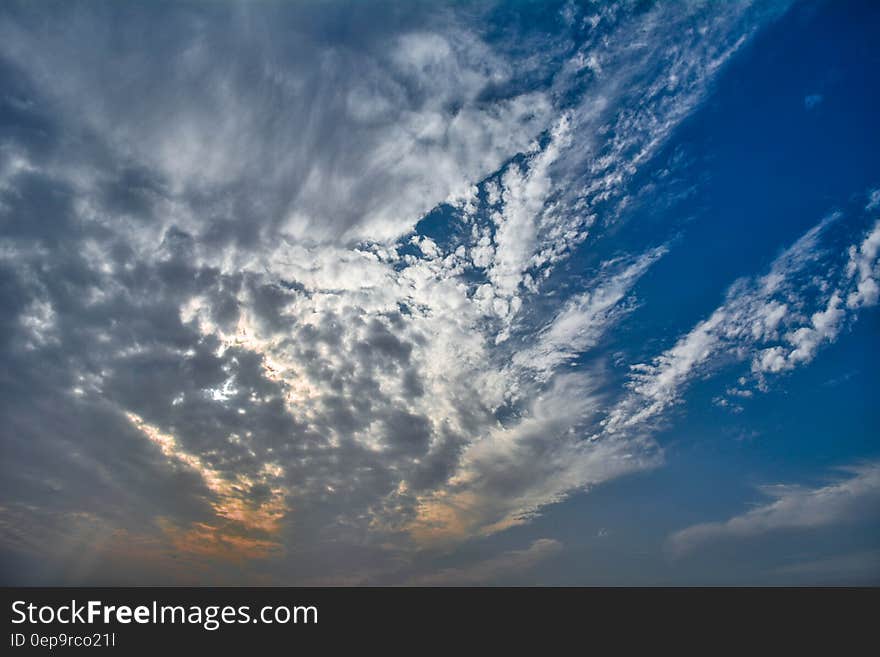 Fluffy clouds on a sunny day.