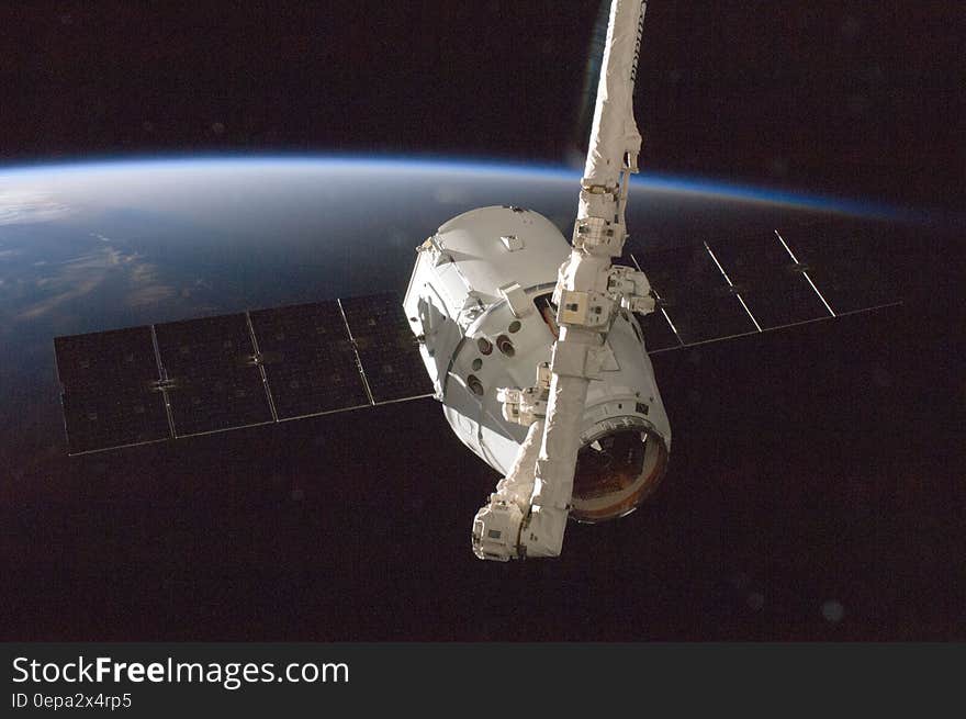 Discovery Space Shuttle orbiting Earth.