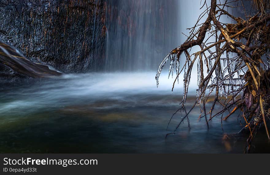 Scenic View of Waterfall during Winter