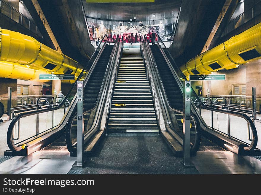 Empty escalators and stairs inside modern train station. Empty escalators and stairs inside modern train station.