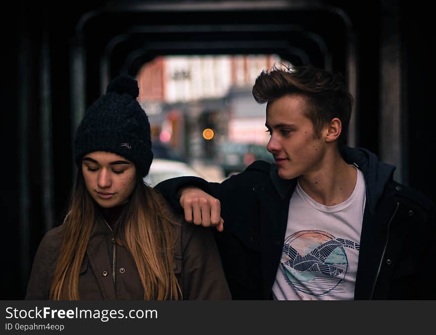 Young Couple in City at Night