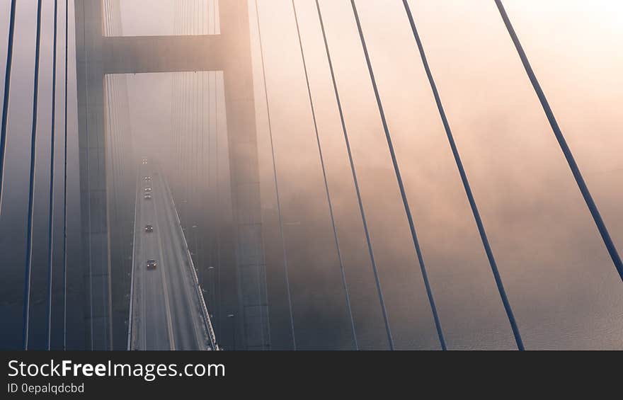 High Angle View of Suspension Bridge Against Sky