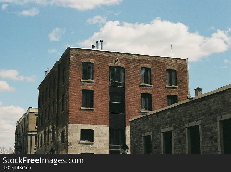 Empty and abandoned factory building under blue skies. Empty and abandoned factory building under blue skies.