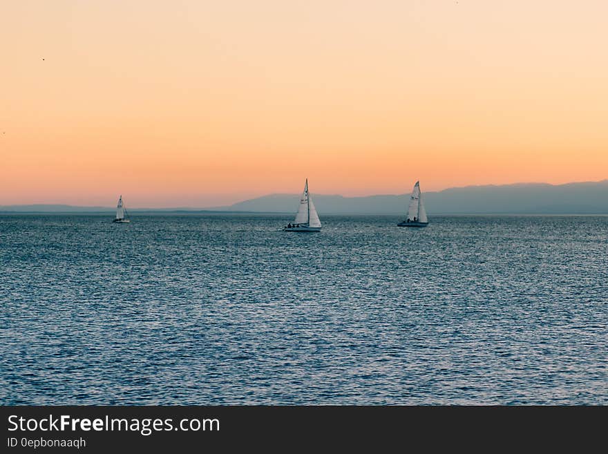 3 Sailboats on Water during Daytime