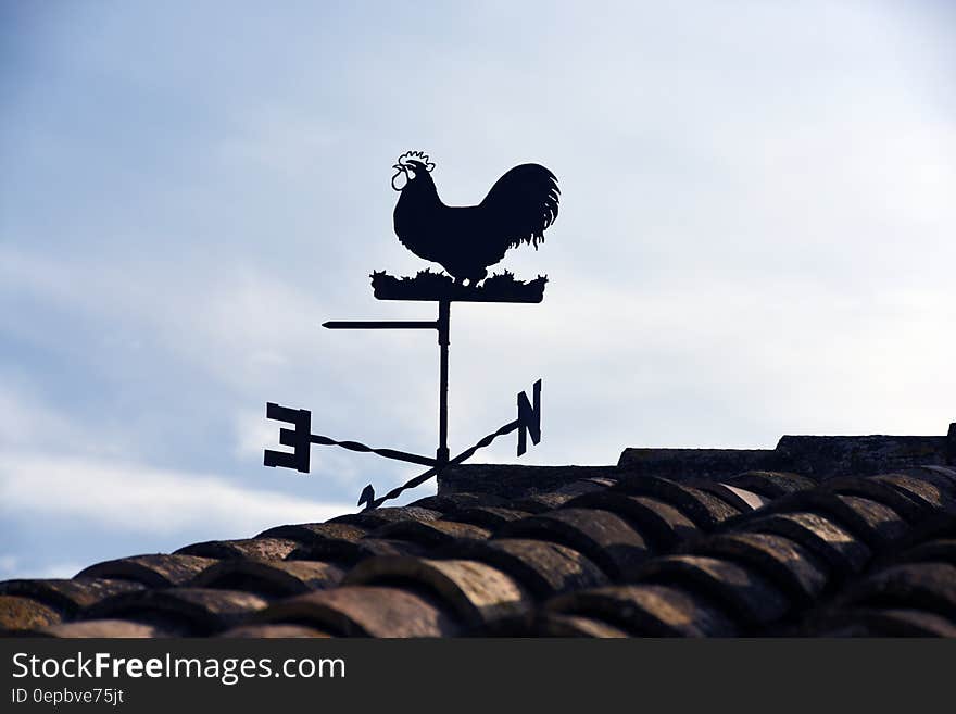 Wind Vane Beside Roof