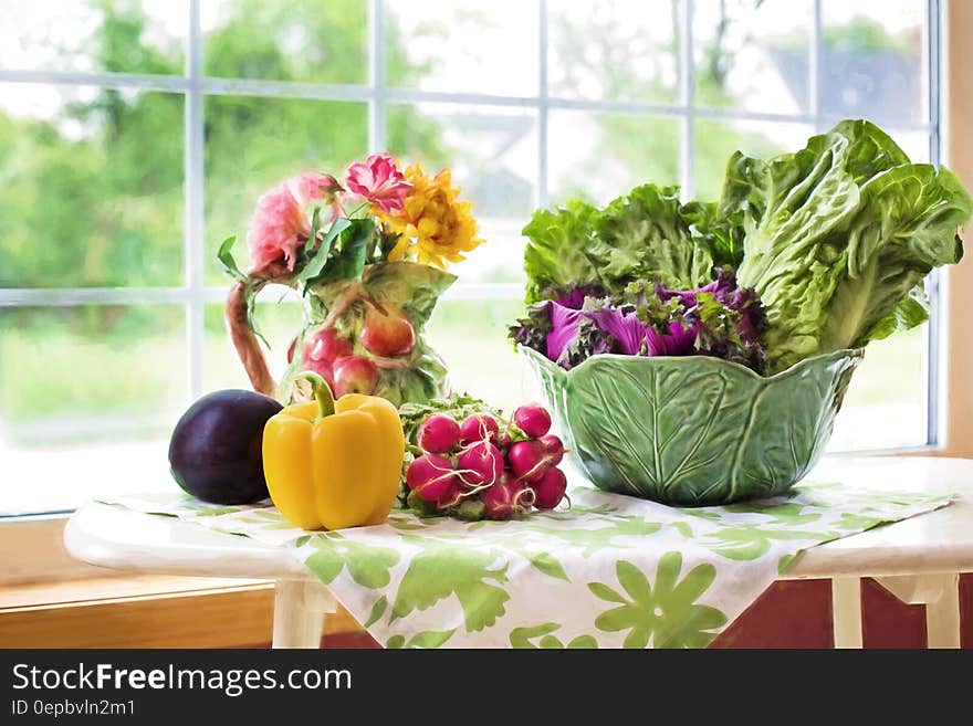 Yellow Bell Pepper Beside Red Cherry Tomato Near Green Ceramic Bowl