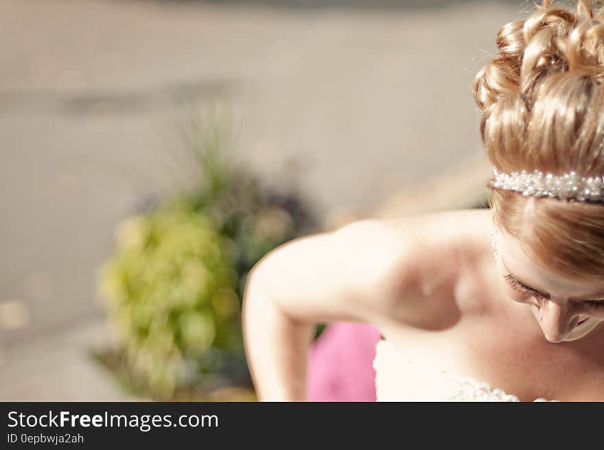 Woman&#x27;s White Strapless Bridal Gown