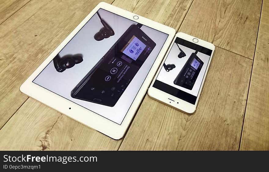 White Ipad Beside Gold Iphone 6