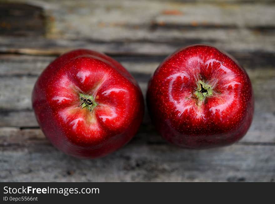 Two Red Ripe Apple on Gray Table