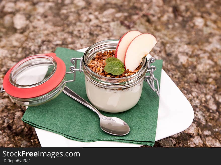 Clear Glass Jar on Green Handkerchief