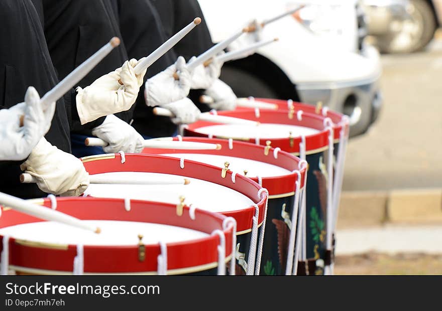 Group of People Playing Drums during Daytime