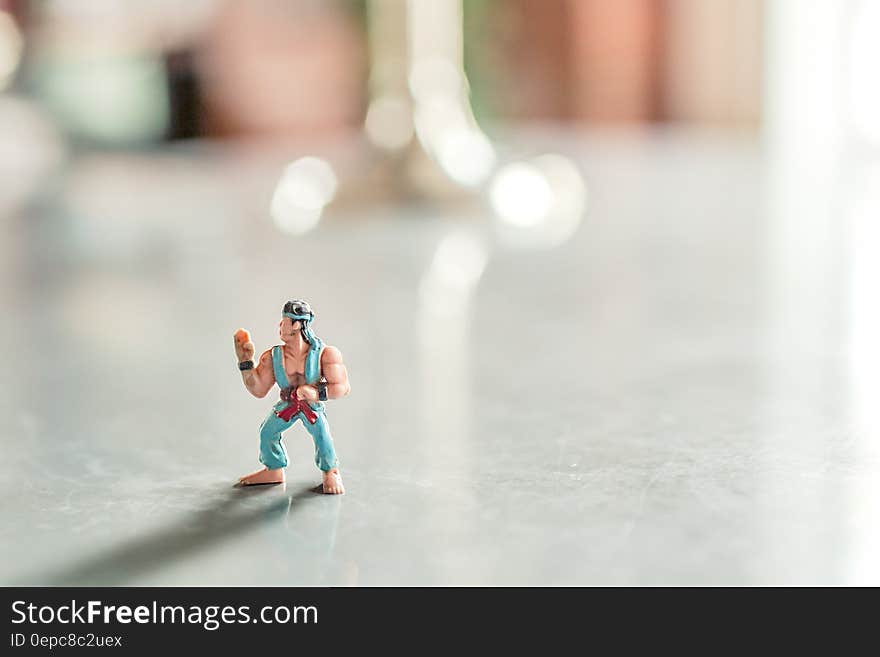 An action figure character on a table.