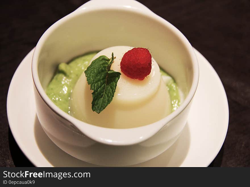 White Ceramic Bowl With White and Green Cream