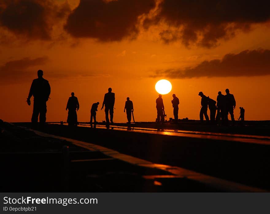 Silhouette of People during Daytime