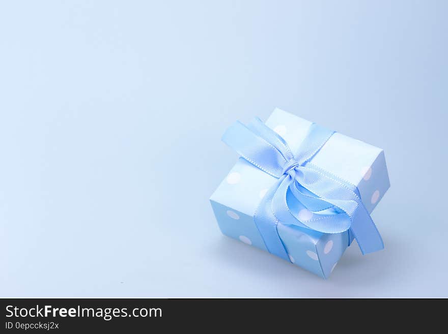 Blue and White Polka Dot Gift Box With Blue Ribbon