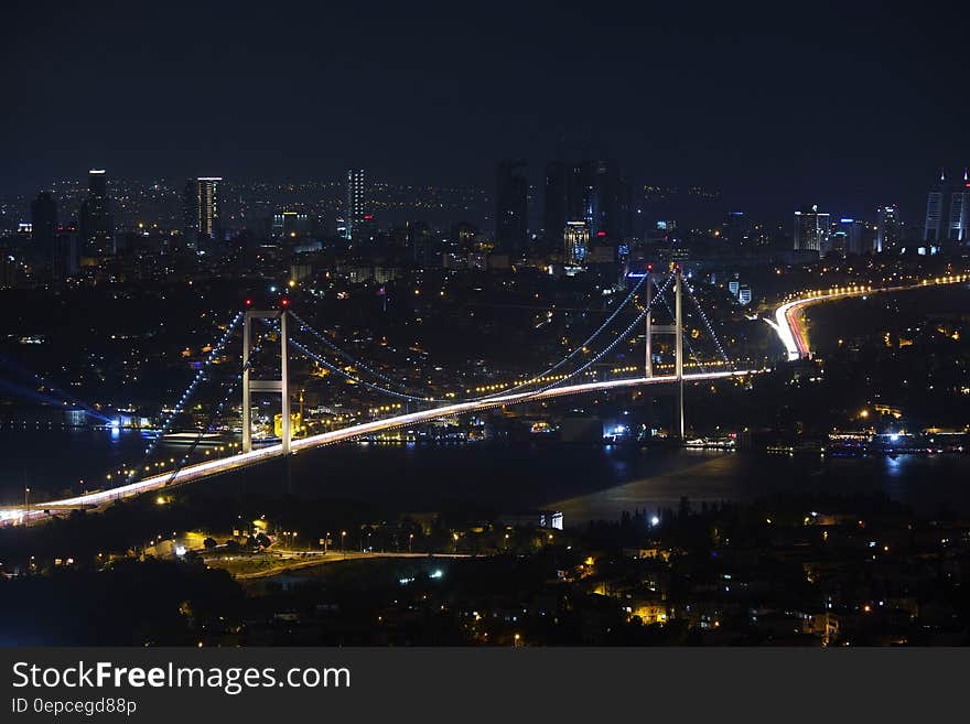 Aerial view of bridge through Istanbul, Turkey illuminated at night. Aerial view of bridge through Istanbul, Turkey illuminated at night.