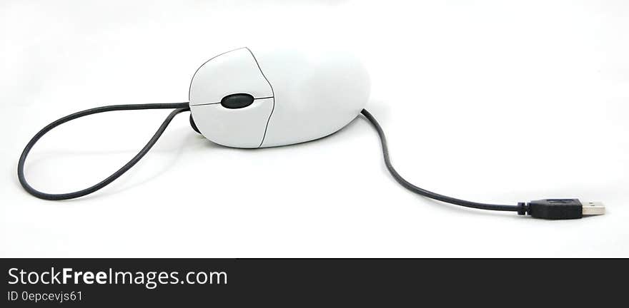 Isolated white computer mouse with cable. Isolated white computer mouse with cable.