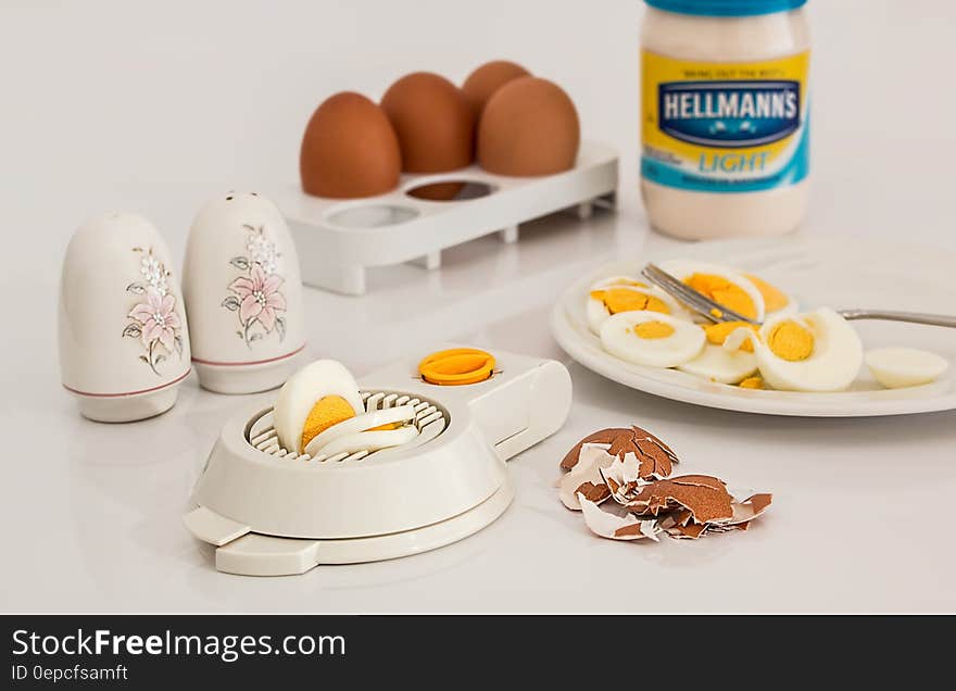 Hellmanks Glass Jar Beside White Egg Rack