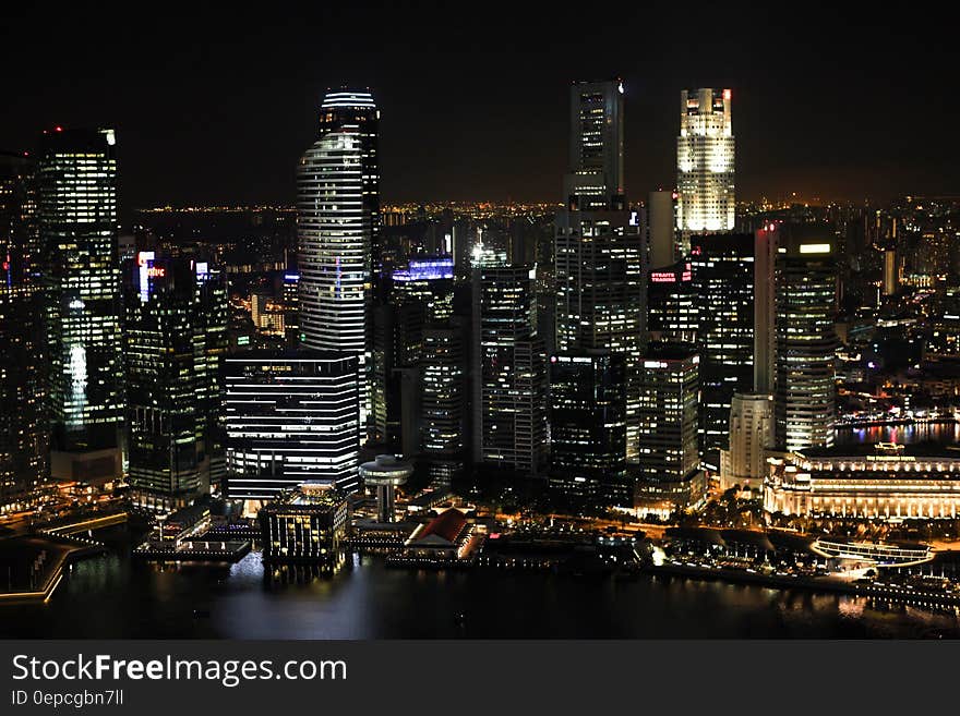 Mid and High Rise Buildings With Lights Turned on during Night