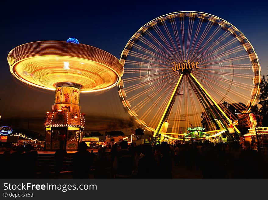 Time Lapse Photo of Circus Rides at Night