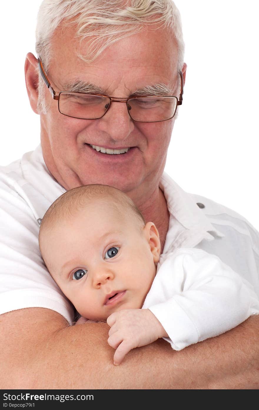 Man in Black Frame Eyeglasses Carrying a Baby