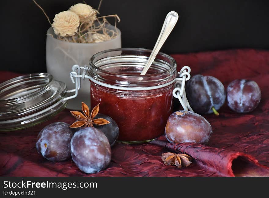 Clear Glass Mason Jar With Red Jelly